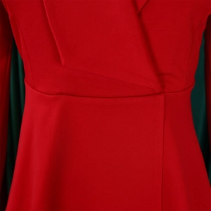 Macro shot of red textured fabric blazer lapel and precision stitching detail