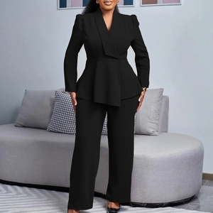 Detail of the chic peplum waist design and multi-button cuffs on a black blazer suit