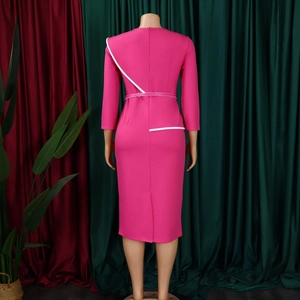 Detailed back view of a slim fit rose red dress with white diagonal stripes and split hem