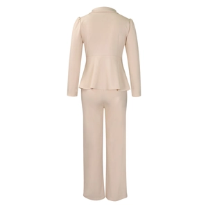 Rear view of elegant beige two-piece set featuring a long sleeve top with ruffle hem detail