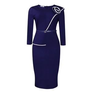 Detail of navy blue pencil dress featuring a 3D white floral shoulder accent and belt