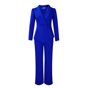 Detail of royal blue business suit showing overlapping collar and buttoned sleeve cuffs