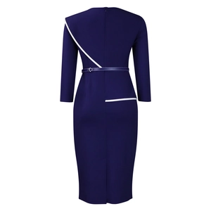 Detail of navy pencil dress with white piping and zipper on the back profile