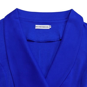 Detailed close-up of dark blue V-neck top with brand label and size M tag on inner collar