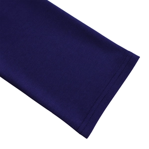 Detail of solid color pencil dress showing elastic ribbed knit fabric and double stitching