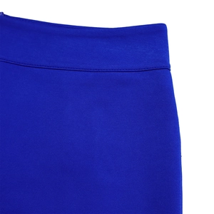 Detailed close-up of royal blue knitted fabric with high-quality double-needle stitching