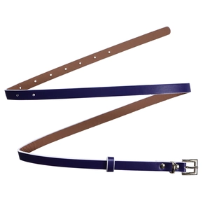 Detail of slim purple belt with silver square metal buckle and brown leather lining