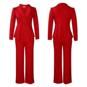Detail of red blazer with peplum waist and matching straight trousers set for women