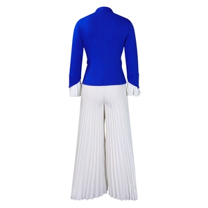 Detail of royal blue blazer back with white pleated flare sleeves and wide pants