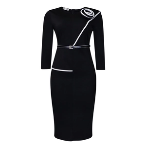 Detail of elegant black pencil dress with 3D spiral flower and white contrast piping
