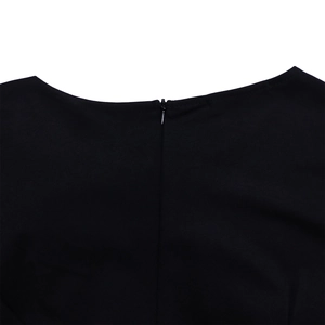 Close-up of invisible back zipper and round neckline on black pencil dress fabric