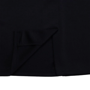 Close-up of the professional back slit and neat hem stitching on a black pencil dress