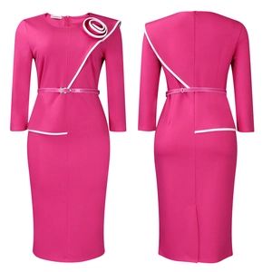 Detail of magenta bodycon dress featuring 3D white rose on shoulder and waist belt