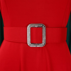 Detail of red dress waist with a sparkling silver rhinestone buckle and matching belt
