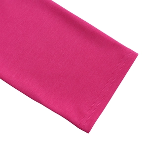 Macro view of magenta knitted sleeve cuff with fine ribbed texture and double stitching