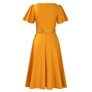 Detail view of the square neck mustard yellow dress with flutter sleeves and back zipper
