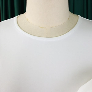 Detail of white round neckline showing high-quality double-needle stitching on fabric