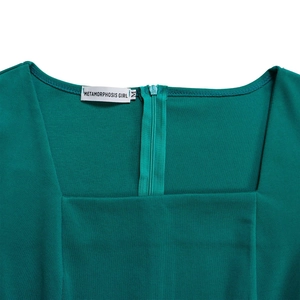 Detail of square neckline with hidden back zipper on emerald green high waist dress