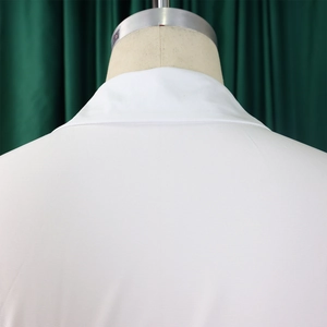 Close-up of white long-sleeved dress collar and shoulder stitching detail