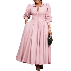 Detail of elegant dusty pink long sleeve shirt dress with buttons and flared hemline