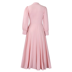 Detail view of the back of a pink maxi dress showing high waist and puff sleeves