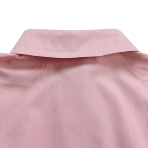 Close-up of pink long-sleeve dress collar and smooth fabric texture detail