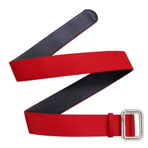 Detail of red elastic waist belt featuring a luxury square buckle with white rhinestones