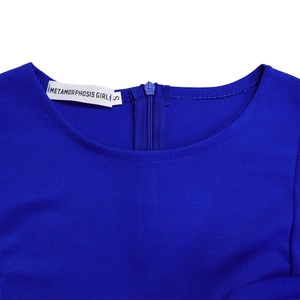 Detail view of the royal blue round neckline with hidden back zipper and brand tag