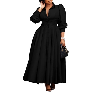Detail view of high-waist A-line black shirt dress with puff sleeves and buttoned front