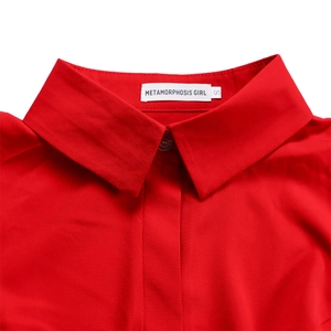 Detailed close-up of the elegant red shirt collar with professional stitching and size label