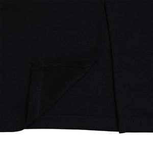 Macro shot of precise side slit stitching and matte fabric texture on the black dress