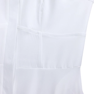 Detailed close-up of pocket stitching and smooth white fabric on an elegant long dress