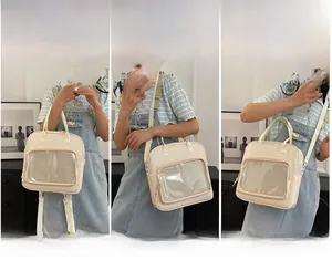 Three ways to wear the cream ita bag with a clear window: handbag, shoulder, and crossbody