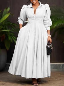 Elegant white long sleeve button-down shirt dress with puff sleeves and flared skirt
