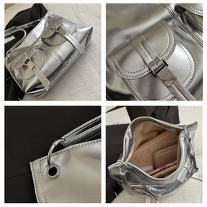 Detail of silver metallic tote bag featuring multiple pockets and large internal capacity