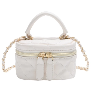 Beige quilted box crossbody bag with gold chain strap and top handle design