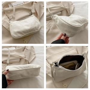 Detailed interior and exterior views of a white snake pattern hobo shoulder bag