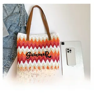 Detailed size reference for a wave patterned straw tote bag with Summer embroidery