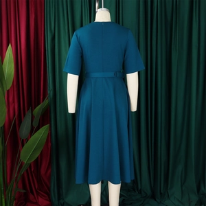 Peacock blue midi dress back view with cinched waist belt and umbrella silhouette