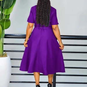 Rear view of an elegant purple A-line midi dress with short sleeves and a matching belt