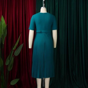 Detail view of the pleated teal dress back featuring a waist belt and concealed zipper