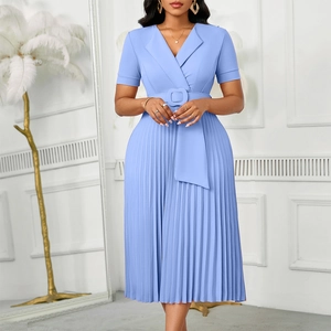 Detail view of light blue V-neck pleated dress with matching waist belt and square buckle