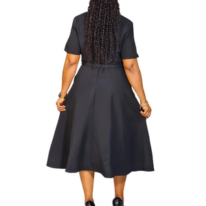 Rear view showing the A-line hem and back cut of a black short sleeve V-neck midi dress