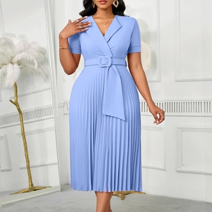 Detail of light blue V-neck pleated dress featuring short sleeves and matching waist belt
