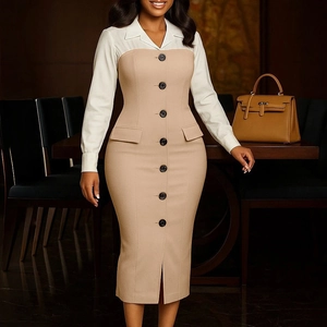 Detail of elegant two-piece style dress with white lapel and buttoned camel pencil skirt