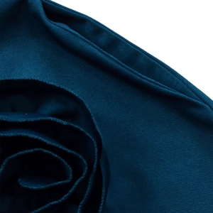 Macro shot of 3D rose fabric detail and twill texture on elegant V-neck dress