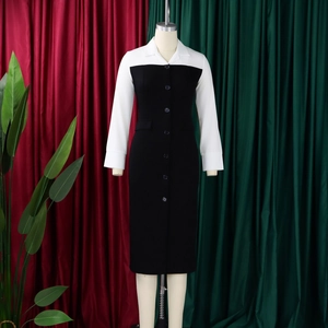 Detail of color-block dress with white shirt collar and black pencil skirt style