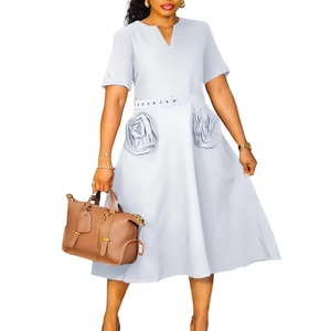 Detail of lilac V-neck A-line dress featuring decorative 3D rose pockets and waist belt