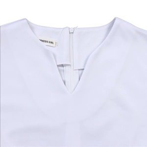 Close-up of V-neckline with invisible back zipper on white elegant A-line summer dress