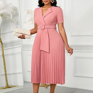 Detail of pink V-neck pleated dress with lapel collar and matching buckled waist belt